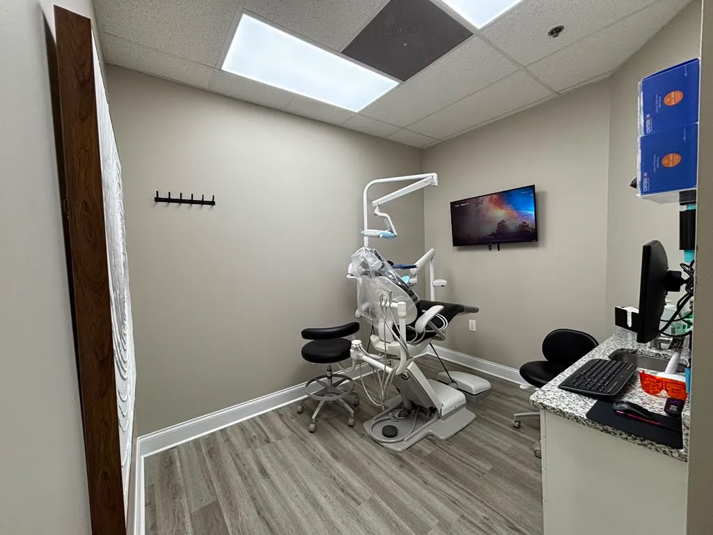 Alpha Dental treatment room with modern equipment